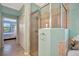 Spa-like bathroom with walk-in shower, soaking tub, double vanity, and neutral tones creating a relaxing retreat at 6642 Willowshire Way, Bradenton, FL 34212