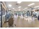 Well-equipped gym with modern exercise machines, ample lighting, and a spacious layout for fitness enthusiasts at 6642 Willowshire Way, Bradenton, FL 34212