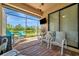 Enjoy the screened-in patio with comfortable seating and pond views at 6642 Willowshire Way, Bradenton, FL 34212