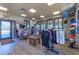 Well-lit pro shop with neat displays of shirts, shoes, hats and other merchandise for sale at 6642 Willowshire Way, Bradenton, FL 34212