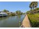View of the canal from the wood planked dock at 6780 Schooner Bay Cir # 6780, Sarasota, FL 34231