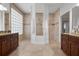 Spa bathroom showcasing walk-in showers, dual vanities, and modern tile work at 6802 68Th E Ave, Bradenton, FL 34203
