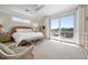 Bedroom with a private walk-out balcony; bask in sunlight from the comfort of your room at 6802 68Th E Ave, Bradenton, FL 34203