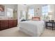 Light and airy bedroom with large windows, vanity, and closet at 6802 68Th E Ave, Bradenton, FL 34203