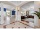 Elegant foyer featuring tile floors, archways, and access to multiple living spaces at 6802 68Th E Ave, Bradenton, FL 34203