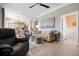 Open-concept living room with neutral decor and seamless flow to the kitchen at 6802 68Th E Ave, Bradenton, FL 34203
