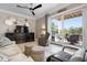 Inviting living room with access to an outdoor deck and scenic views at 6802 68Th E Ave, Bradenton, FL 34203