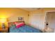 Comfortable bedroom showcasing a bed, a window, and closet space at 7858 Eagle Creek Dr # 7442, Sarasota, FL 34243