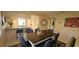 Inviting dining area with a wooden table, seating for six, and views of the kitchen at 7858 Eagle Creek Dr # 7442, Sarasota, FL 34243