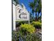 Eagle Creek community sign surrounded by lush tropical landscaping, creating welcoming entrance to neighborhood at 7858 Eagle Creek Dr # 7442, Sarasota, FL 34243