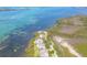 Beautiful waterfront homes with lush surroundings along Florida's coast, showcasing stunning ocean access at 79 Tidy Island Blvd, Bradenton, FL 34210