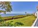Beautiful backyard with green grass and bay view at 79 Tidy Island Blvd, Bradenton, FL 34210