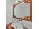 Bathroom with a unique sink and mirror at 79 Tidy Island Blvd, Bradenton, FL 34210