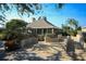 Beautiful building featuring a brick entryway, lush plants, and manicured landscaping in a serene community setting at 79 Tidy Island Blvd, Bradenton, FL 34210