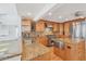 Modern kitchen features granite countertops, stainless steel appliances, and a functional island at 79 Tidy Island Blvd, Bradenton, FL 34210