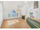 Spacious living room featuring hardwood floors, a fireplace, and bay views at 79 Tidy Island Blvd, Bradenton, FL 34210