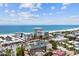 Aerial view of condo complex near the beach with ocean views in a red circle at 845 Benjamin Franklin Dr # 101, Sarasota, FL 34236