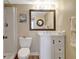 Updated bathroom with a glass-enclosed shower, vanity, and modern fixtures at 845 Benjamin Franklin Dr # 101, Sarasota, FL 34236