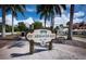 Welcome to St. Armands Key, a sign post featuring tropical palms in a lush Florida neighborhood at 845 Benjamin Franklin Dr # 101, Sarasota, FL 34236