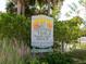 Ted Sperling Park sign surrounded by lush greenery at 845 Benjamin Franklin Dr # 101, Sarasota, FL 34236