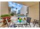 Lovely patio with comfortable seating, poolside view, and perfect relaxation space at 845 Benjamin Franklin Dr # 101, Sarasota, FL 34236