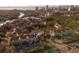 Aerial view showcases the community's layout, beautiful landscaping, and proximity to the water at 850 S Tamiami Trl # 529, Sarasota, FL 34236