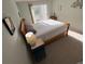 Comfortable bedroom with a sliding door leading to a balcony and complemented by soft, natural lighting at 850 S Tamiami Trl # 529, Sarasota, FL 34236