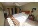 Inviting bedroom with a neutral palette, plush carpeting, and a comfortable king-size bed at 850 S Tamiami Trl # 529, Sarasota, FL 34236