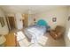 Spacious bedroom with natural light, ceiling fan, and en-suite bathroom at 850 S Tamiami Trl # 529, Sarasota, FL 34236