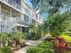 Beautiful building exterior with well-maintained landscaping and a sidewalk for leisurely strolls at 850 S Tamiami Trl # 529, Sarasota, FL 34236