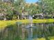Scenic pond view with fountain enhances the tranquility of this waterfront property at 850 S Tamiami Trl # 529, Sarasota, FL 34236