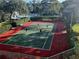 Aerial view of well-maintained tennis courts, perfect for active community recreation at 850 S Tamiami Trl # 529, Sarasota, FL 34236