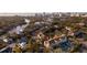 Breathtaking aerial view showcasing the complex's prime location near the water and cityscape at 850 S Tamiami Trl # 704, Sarasota, FL 34236