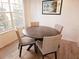 Bright dining area with table that seats four located near a large window at 850 S Tamiami Trl # 704, Sarasota, FL 34236