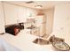 Compact kitchen with essential appliances and ample countertop space at 850 S Tamiami Trl # 704, Sarasota, FL 34236