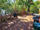Spacious outdoor deck with chairs, table, and grill overlooking the water, for outdoor dining at 850 S Tamiami Trl # 704, Sarasota, FL 34236