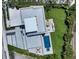 Modern home with a rooftop terrace, pool, and backyard oasis at 8800 Midnight Pass Rd, Sarasota, FL 34242