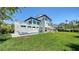 Beautiful backyard with a pool and plenty of green space at 8800 Midnight Pass Rd, Sarasota, FL 34242