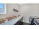 Well-equipped laundry room with sleek countertops, modern appliances, and ample storage space at 8800 Midnight Pass Rd, Sarasota, FL 34242