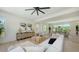 Bright and spacious living room with stylish decor, lots of natural light at 8800 Midnight Pass Rd, Sarasota, FL 34242