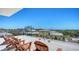 Relax on this rooftop deck with lounge chairs and a great ocean view at 8800 Midnight Pass Rd, Sarasota, FL 34242