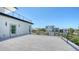 Spacious rooftop deck with modern railings offering stunning views of the surrounding area at 8800 Midnight Pass Rd, Sarasota, FL 34242