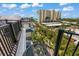 Beautiful coastal home featuring a spiral staircase and scenic neighborhood views at 89 Avenida Messina, Sarasota, FL 34242