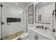 Modern bathroom featuring a glass-enclosed shower, sleek fixtures, and elegant tile work, creating a spa-like experience at 89 Avenida Messina, Sarasota, FL 34242
