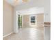 Open dining room space that has tile flooring and neutral paint at 891 Palmetto Ne Dr, Port Charlotte, FL 33952
