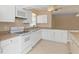 Spacious kitchen featuring modern appliances and ample cabinet space at 891 Palmetto Ne Dr, Port Charlotte, FL 33952