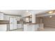 Modern kitchen design with updated appliances, and a breakfast bar at 891 Palmetto Ne Dr, Port Charlotte, FL 33952