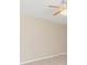 Neutrally painted living room with tile flooring and a ceiling fan at 891 Palmetto Ne Dr, Port Charlotte, FL 33952