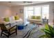 Bright and inviting living room featuring comfortable sofas and stylish decor at 91 Avenida Veneccia, Sarasota, FL 34242