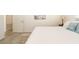 Bright bedroom with a comfortable bed, decorative pillows, and a calming aesthetic at 1018 Charlotte Ave, Sarasota, FL 34237